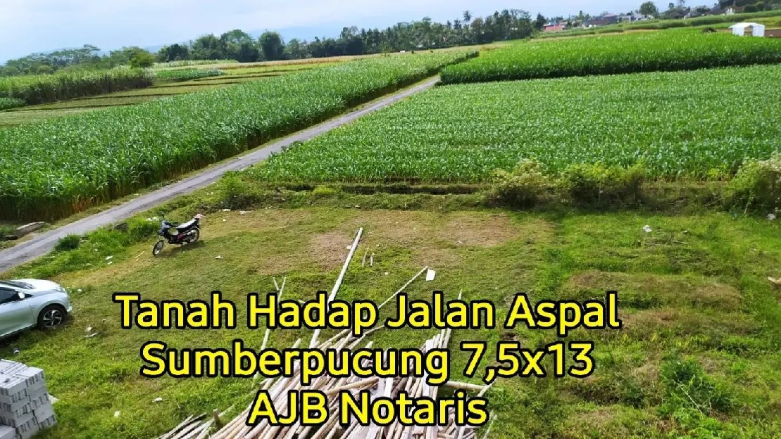 TANAH HADAP JALAN ASPAL MALANG